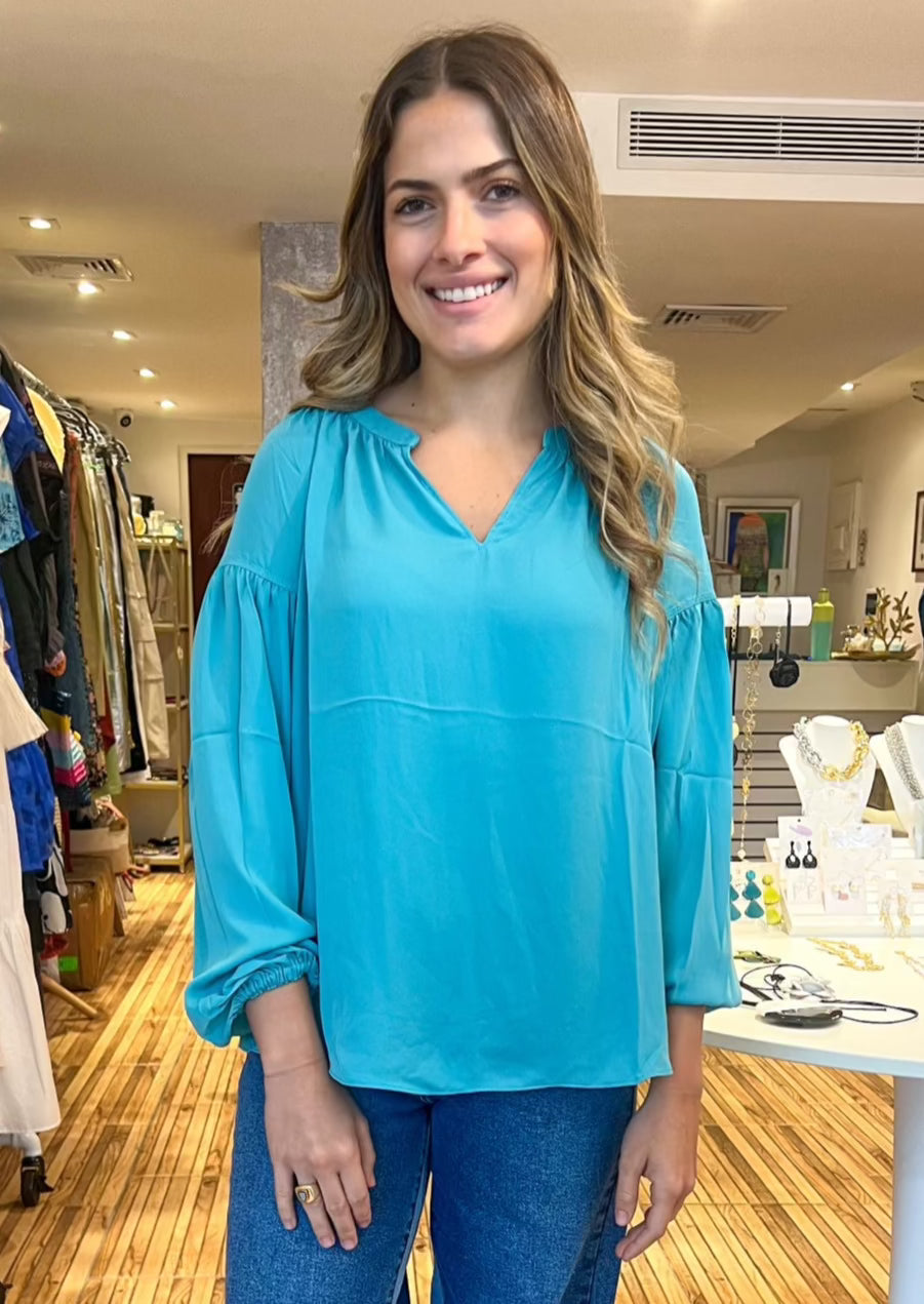 Long sleeve split henry neck blouse with stitch detail on sleeve.&nbsp;