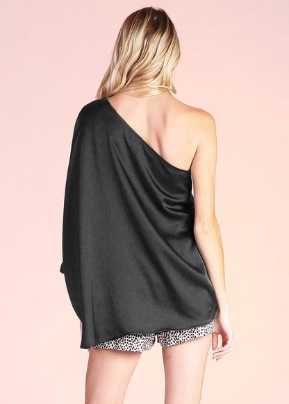 Our gorgeous Shiny Hammered Satin One Sleeve Top is a must-have for your closet. This elevated top features our new shiny fabric that is lush, soft and luxurious. The one shoulder neckline falls to the waist and can be styled loose or tucked into your bottoms.