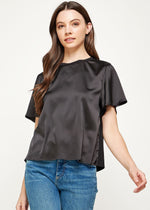 Load image into Gallery viewer, Black satin tee top with contrast knit back. This upgraded t-shirt features front body in satin, short flutter sleeves, and back in knit fabric.
