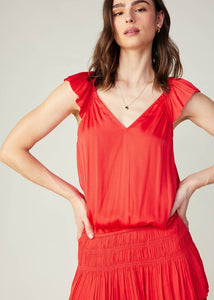 Bright red sweetheart neck pleated sleeve elastic waisted tiered short dress with smocking and pleat at skirt.