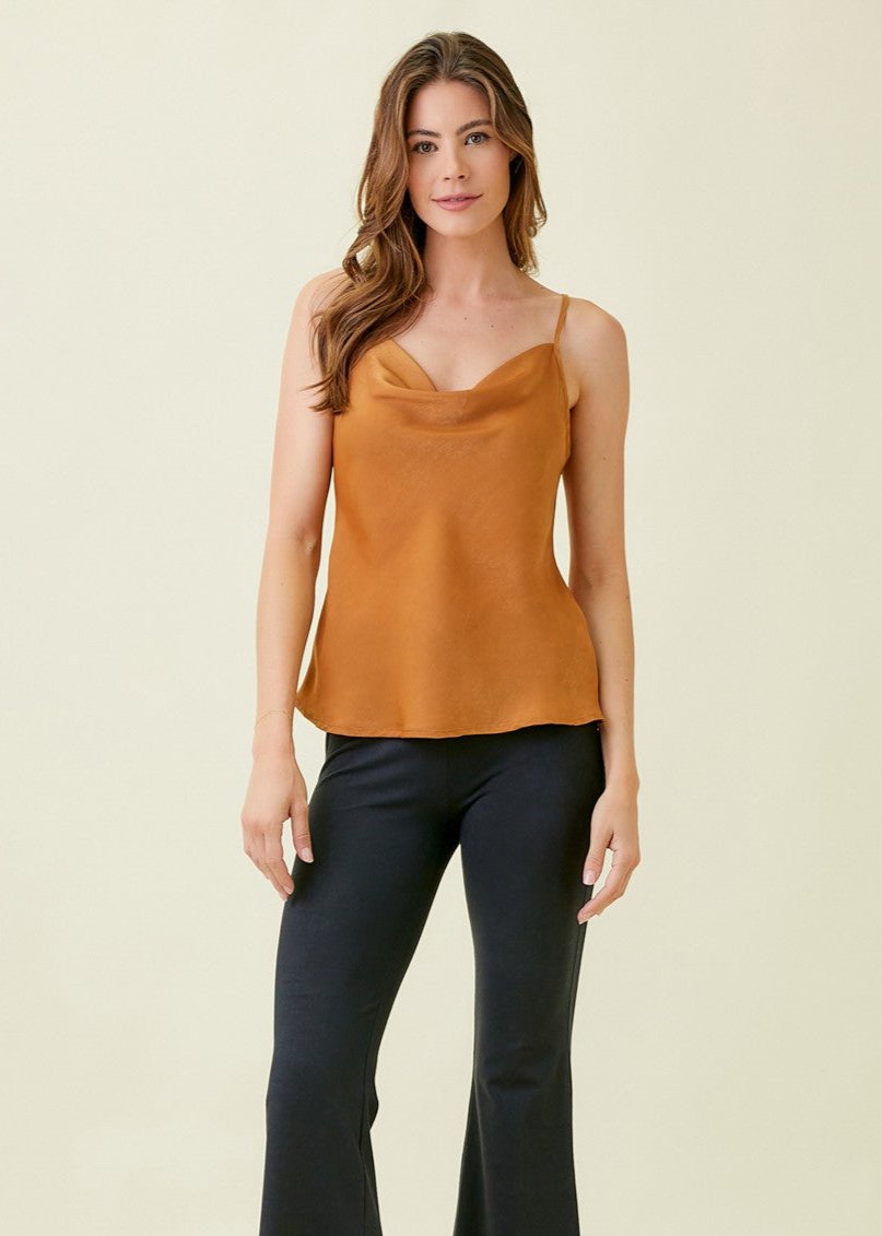 Silky draped neck camisole. Adjustable straps. Loose fit. Classic cowl neck top. Pairs well with any bottoms.