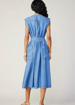 Load image into Gallery viewer, Chambray sleeveless v-neck button down 3/4 length dress with self tie detail on waist and flap pocket on sides.

