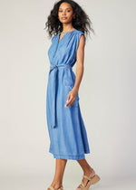 Load image into Gallery viewer, Chambray sleeveless v-neck button down 3/4 length dress with self tie detail on waist and flap pocket on sides.
