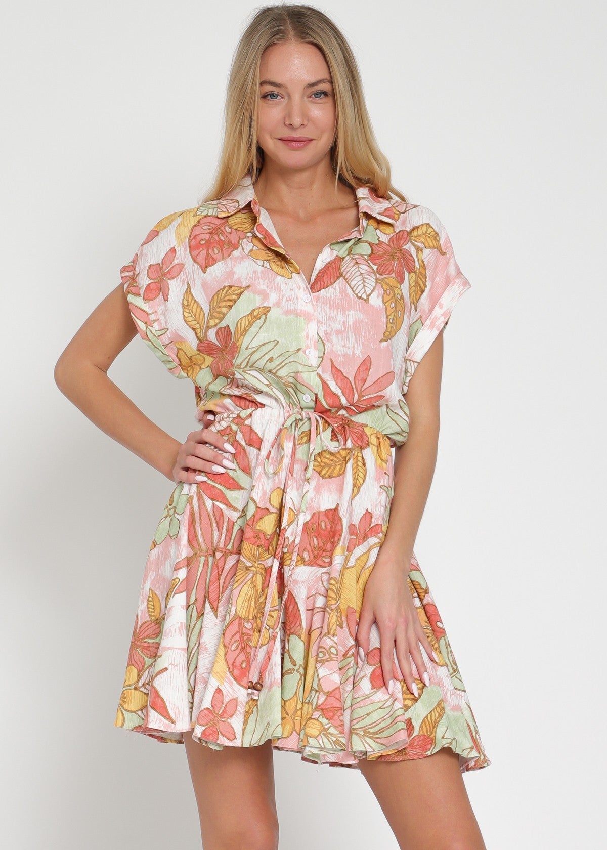 Woman wearing a floral dress on a white background