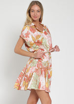 Load image into Gallery viewer, Woman wearing a floral dress on a white background
