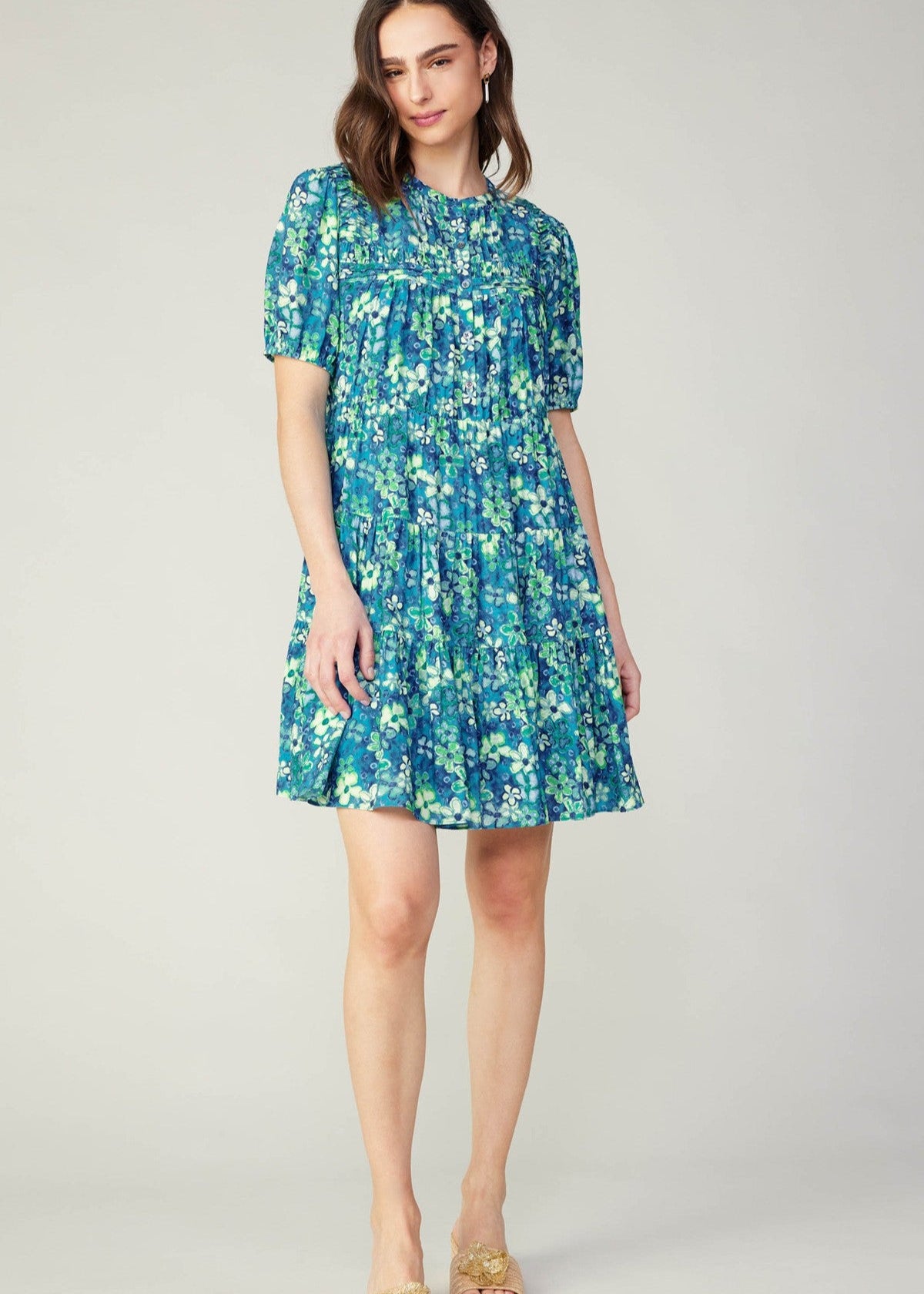 Blue floral print short sleeve tiered short dress.