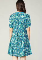 Load image into Gallery viewer, Blue floral print short sleeve tiered short dress.
