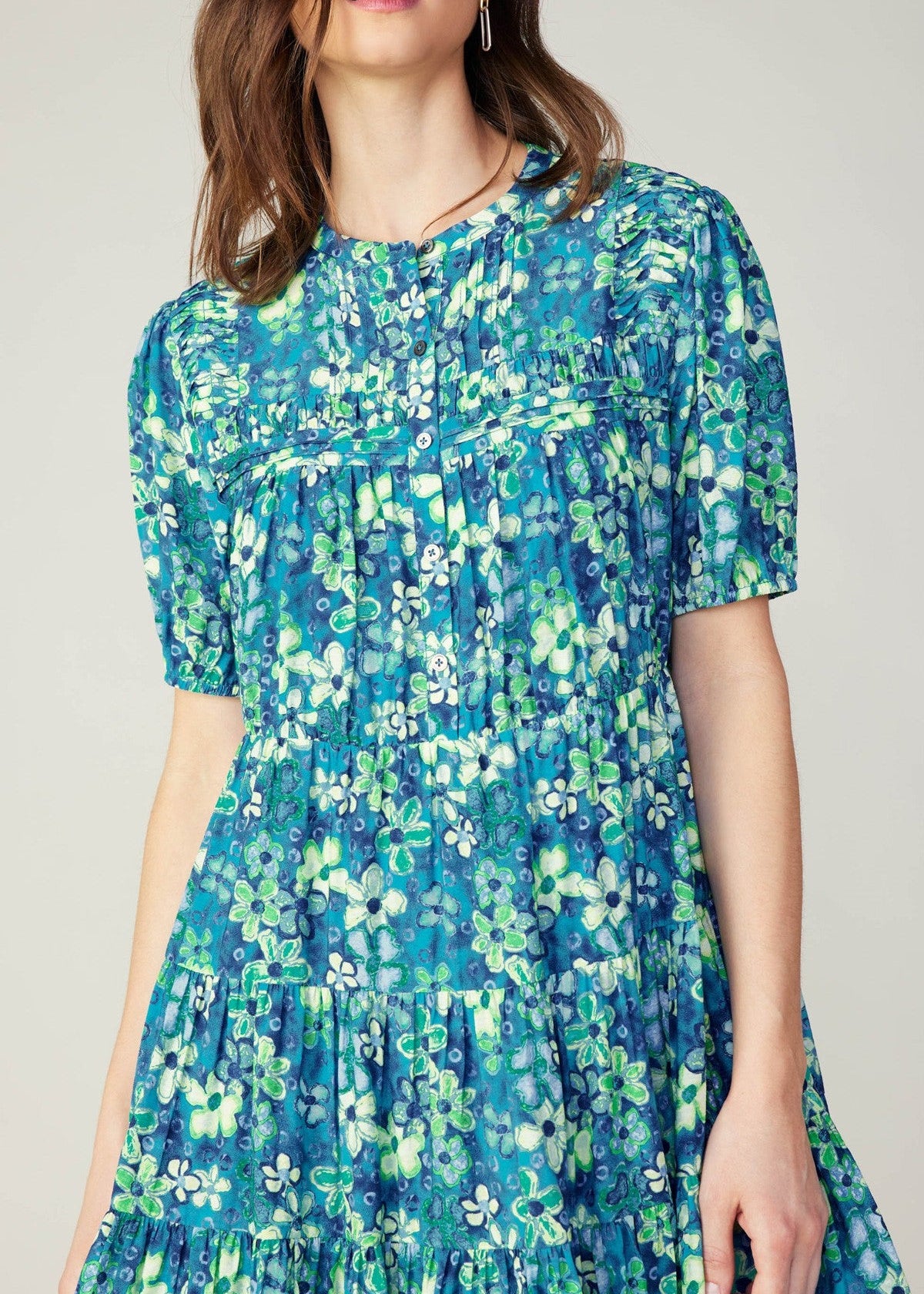 Blue floral print short sleeve tiered short dress.