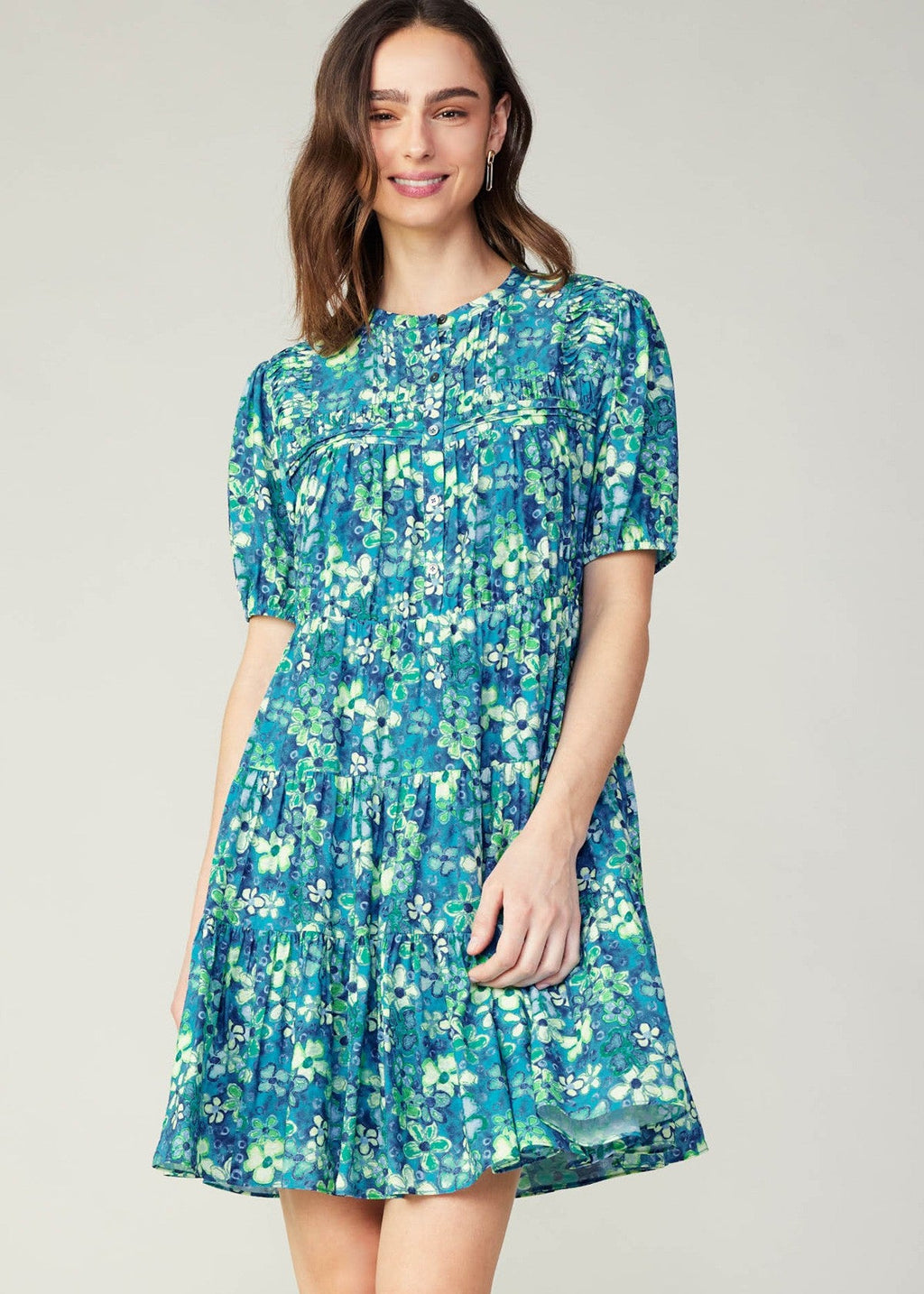 Blue floral print short sleeve tiered short dress.