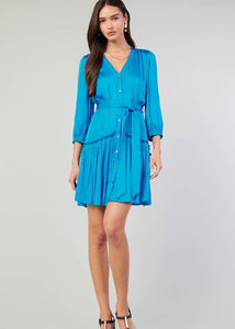 Blue v-neck 3/4 sleeve short button down dress with ruffled detail on skirt.