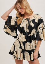 Load image into Gallery viewer, Black floral off the shoulder bell sleeved romper.
