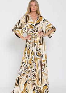 Woman wearing a patterned dress on a white background