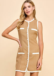 Mocha sleeveless, textured fabric dress with button down detail. Featuring a different color trim and faux pockets.