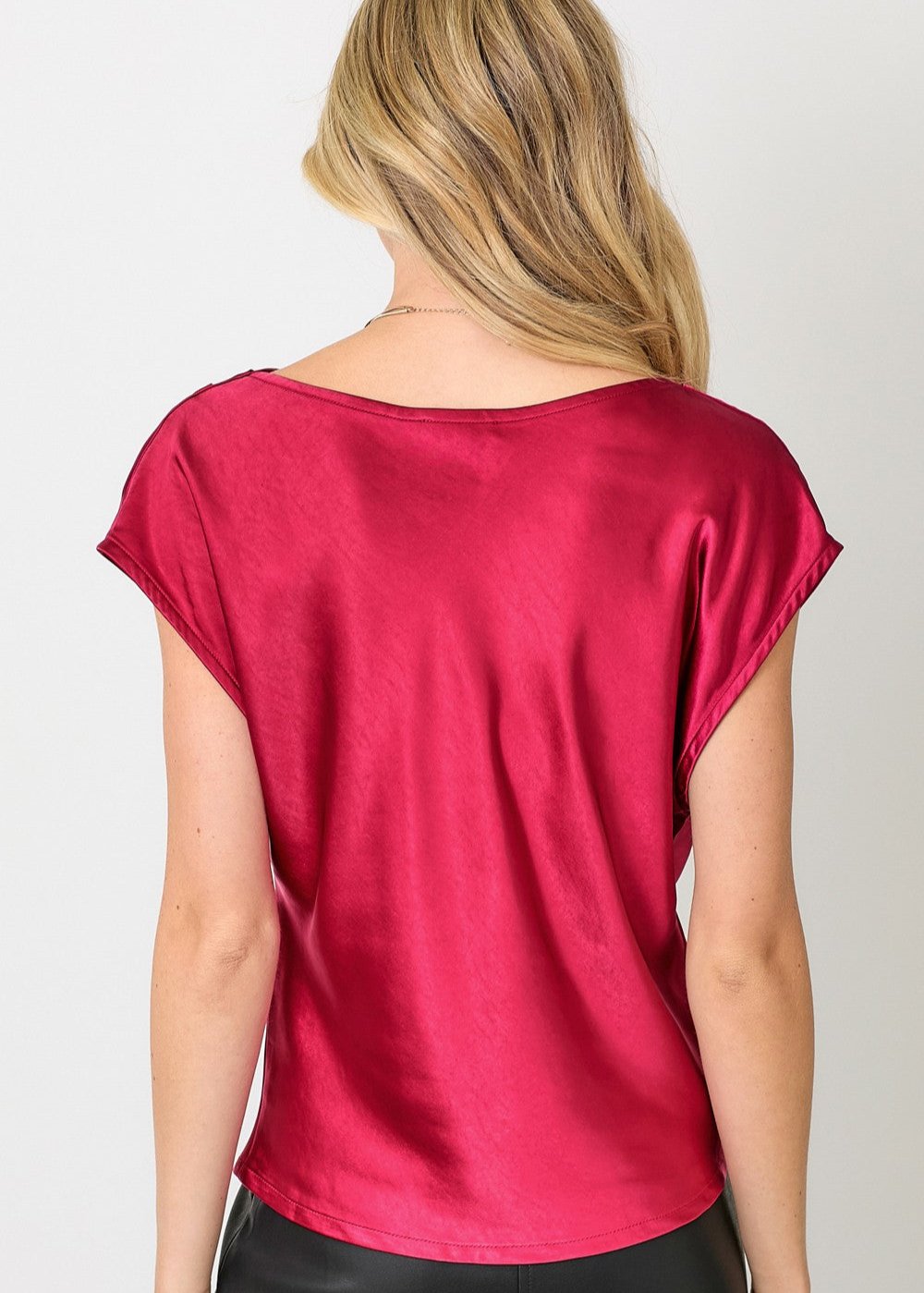 Satin cowl neck top. Cap sleeves. Loose fit. Elegant and can be worn with any pants or skirts.