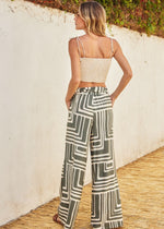 Load image into Gallery viewer, Printed viscose blend wide leg pants. Elastic waist with belt loop. Optional sash belt.
