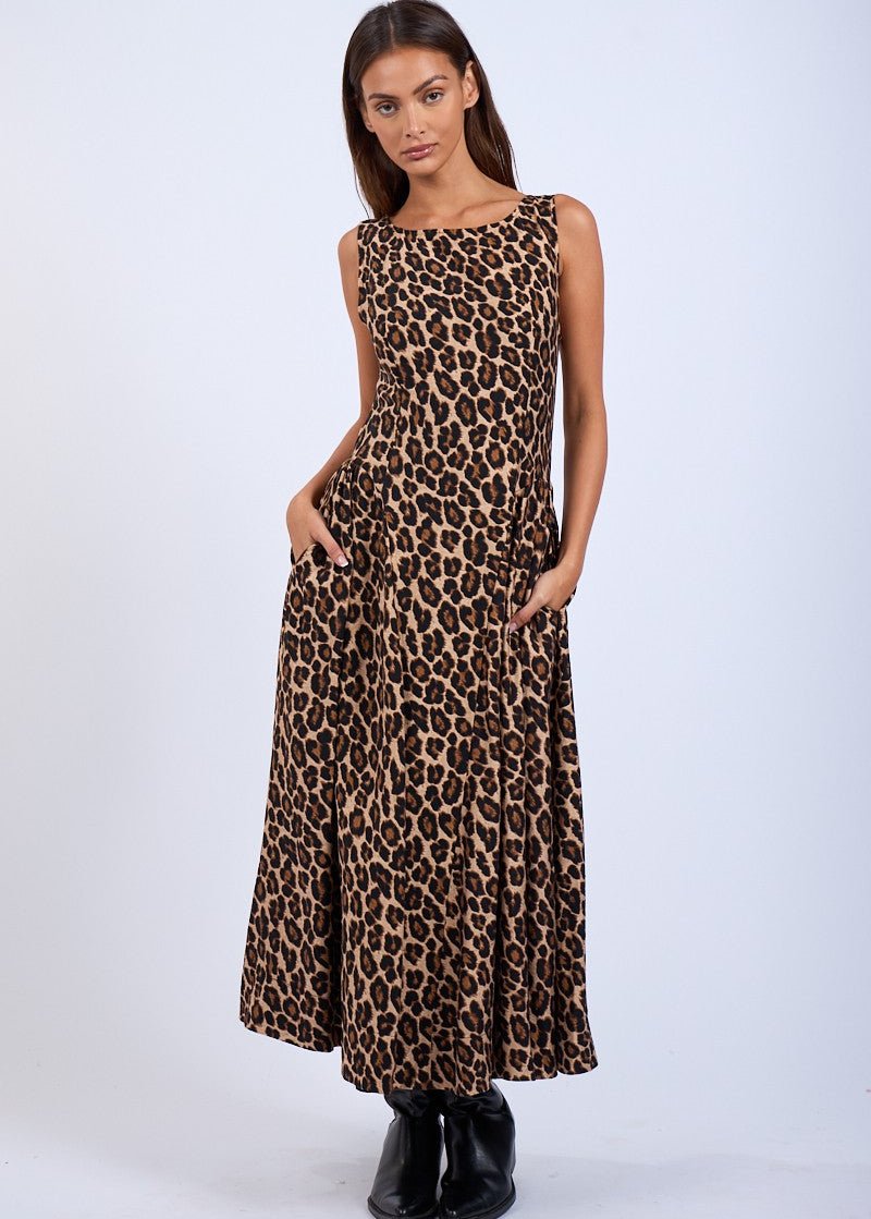 Chetah print u-shape boat neck flare midi dress with side pockets.