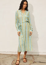 Load image into Gallery viewer, Tropical breeze print longline dress. Features button down closure, side slit detail and side pockets.
