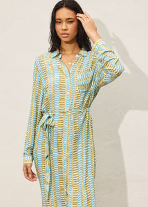 Tropical breeze print longline dress. Features button down closure, side slit detail and side pockets.
