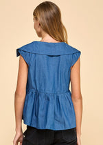 Load image into Gallery viewer, A denim sleeveless top featuring a collared neckline and a wide peplum hem, adding a touch of elegance and flair.
