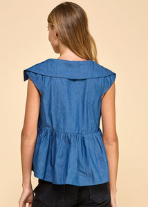 A denim sleeveless top featuring a collared neckline and a wide peplum hem, adding a touch of elegance and flair.