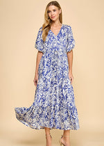 Load image into Gallery viewer, Navy abstract floral print midi dress featuring a V-neck, puffed sleeves, waist tie, and a tiered skirt. Fully lined.
