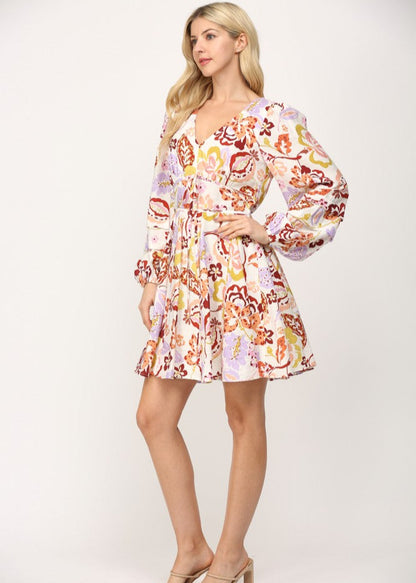 Cream multi print shirred waist v-neck fit and flare short dress.
