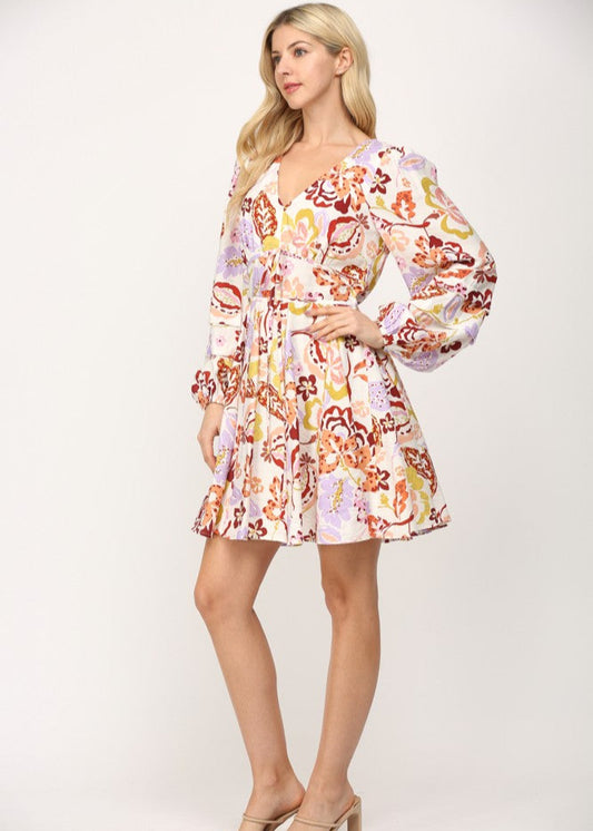 Cream multi print shirred waist v-neck fit and flare short dress.