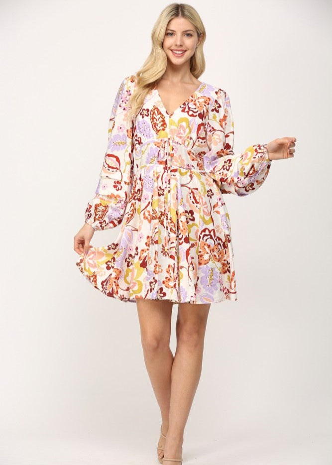 Cream multi print shirred waist v-neck fit and flare short dress.