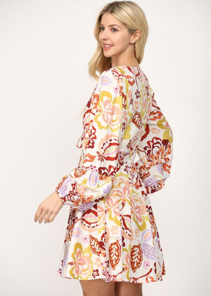Cream multi print shirred waist v-neck fit and flare short dress.