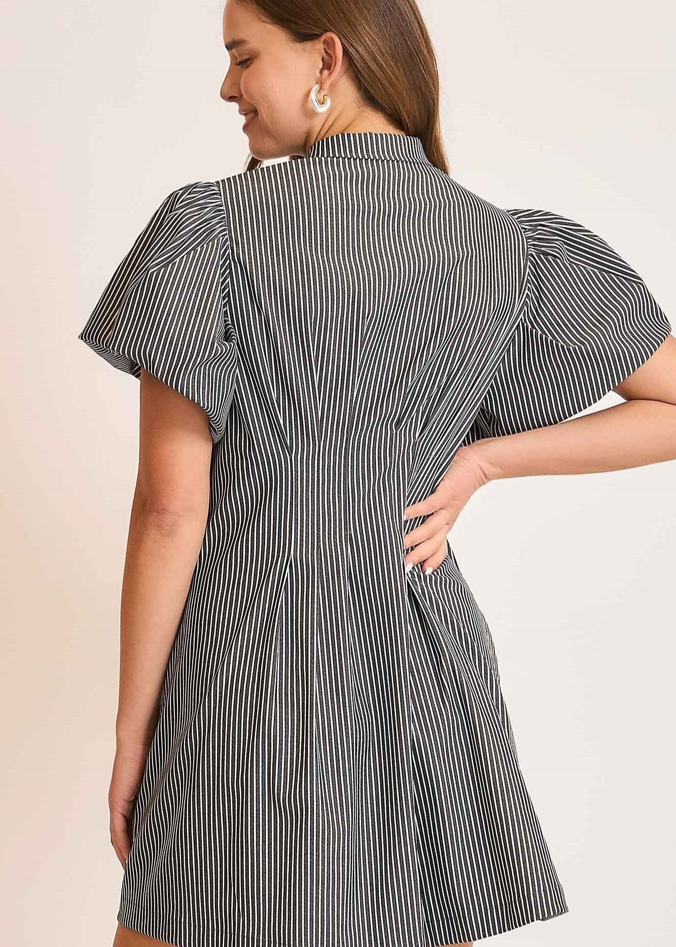 Navy and white stripped collared shirt dress. Bubble sleeves. Hem waist pleated. Has pockets.
