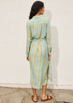 Load image into Gallery viewer, Tropical breeze print longline dress. Features button down closure, side slit detail and side pockets.
