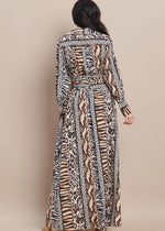 Load image into Gallery viewer, Animal print surplice front long sleeve shirred waist maxi dress.
