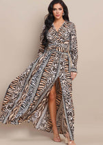 Load image into Gallery viewer, Animal print surplice front long sleeve shirred waist maxi dress.
