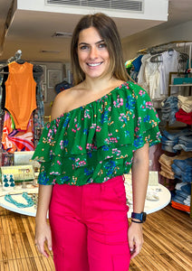 Color your world with multi color floral clusters that make up the Ivana print. It shapes the evergreen, Charmer top. A single shoulder with a double ruffle layer that overlays a voluminous cropped bodice. Style it with trouser shorts and loafers for a completed look.