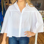 Load image into Gallery viewer, Loose fitting bell sleeve button down blouse. Available in pink and white.

