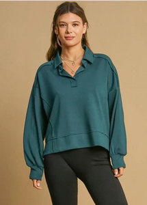 Matching two piece set. Luxeknit material loose fit polo style sweatshirt. Wide waistband for fit and comfort. Cuffed ankles. Pockets. 