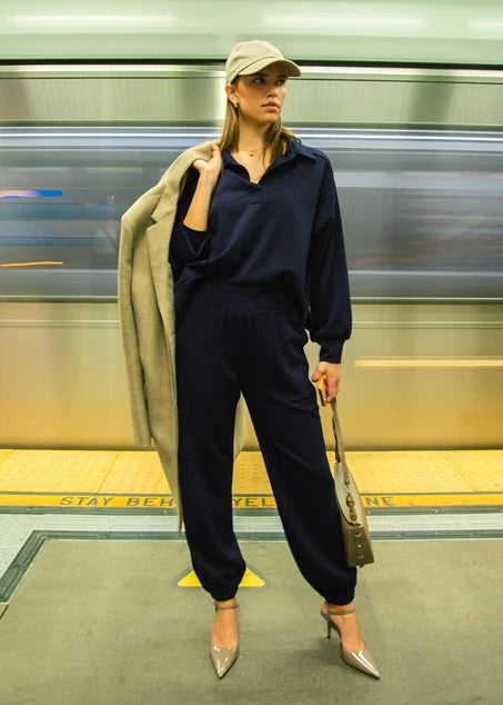 Matching two piece set. Luxeknit material loose fit polo style sweatshirt. Wide waistband for fit and comfort. Cuffed ankles. Pockets. 