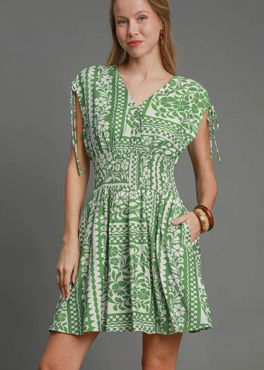 Green flower print short dress.
