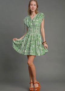 Green flower print short dress.