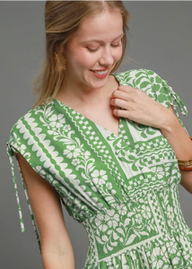 Green flower print short dress.