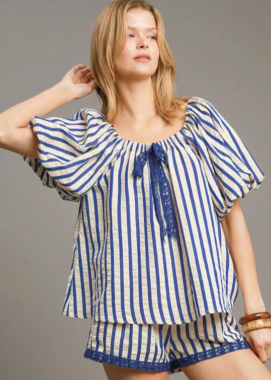 Royal blue striped print shirred detail top.