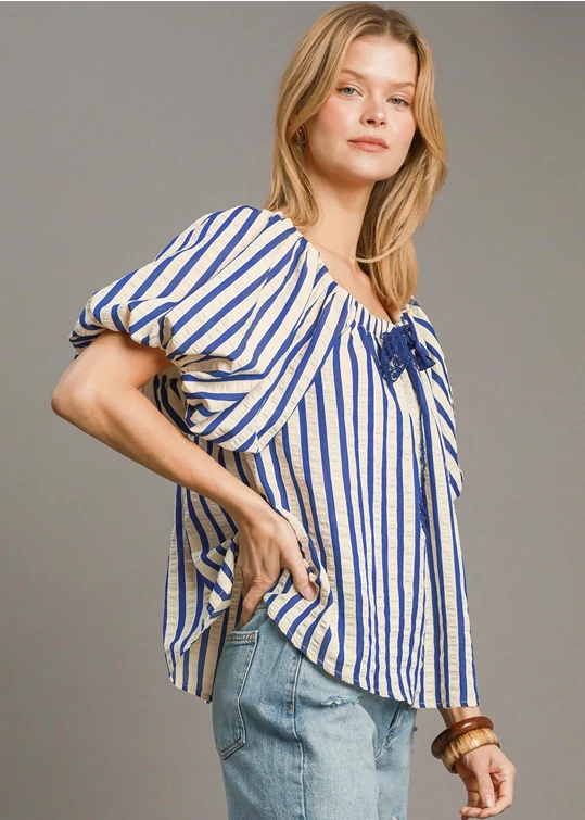 Royal blue striped print shirred detail top.