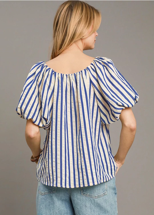 Royal blue striped print shirred detail top.