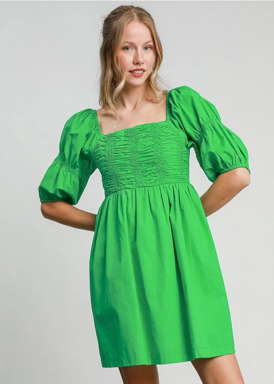 Green smocked half sleeve dress. Smocked. Balloon sleeve.