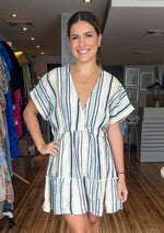 Load image into Gallery viewer, White and blue striped short dress with elastic waistband and v-neckline.
