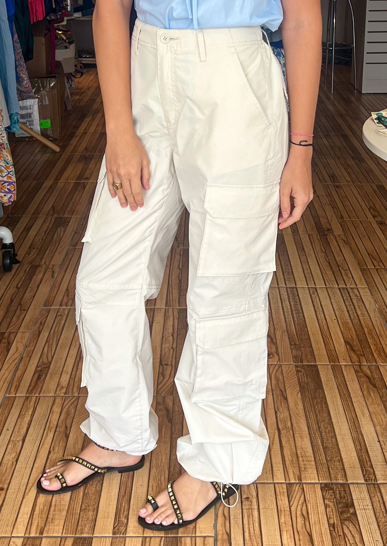 High waisted parachute pants with side and back pockets.