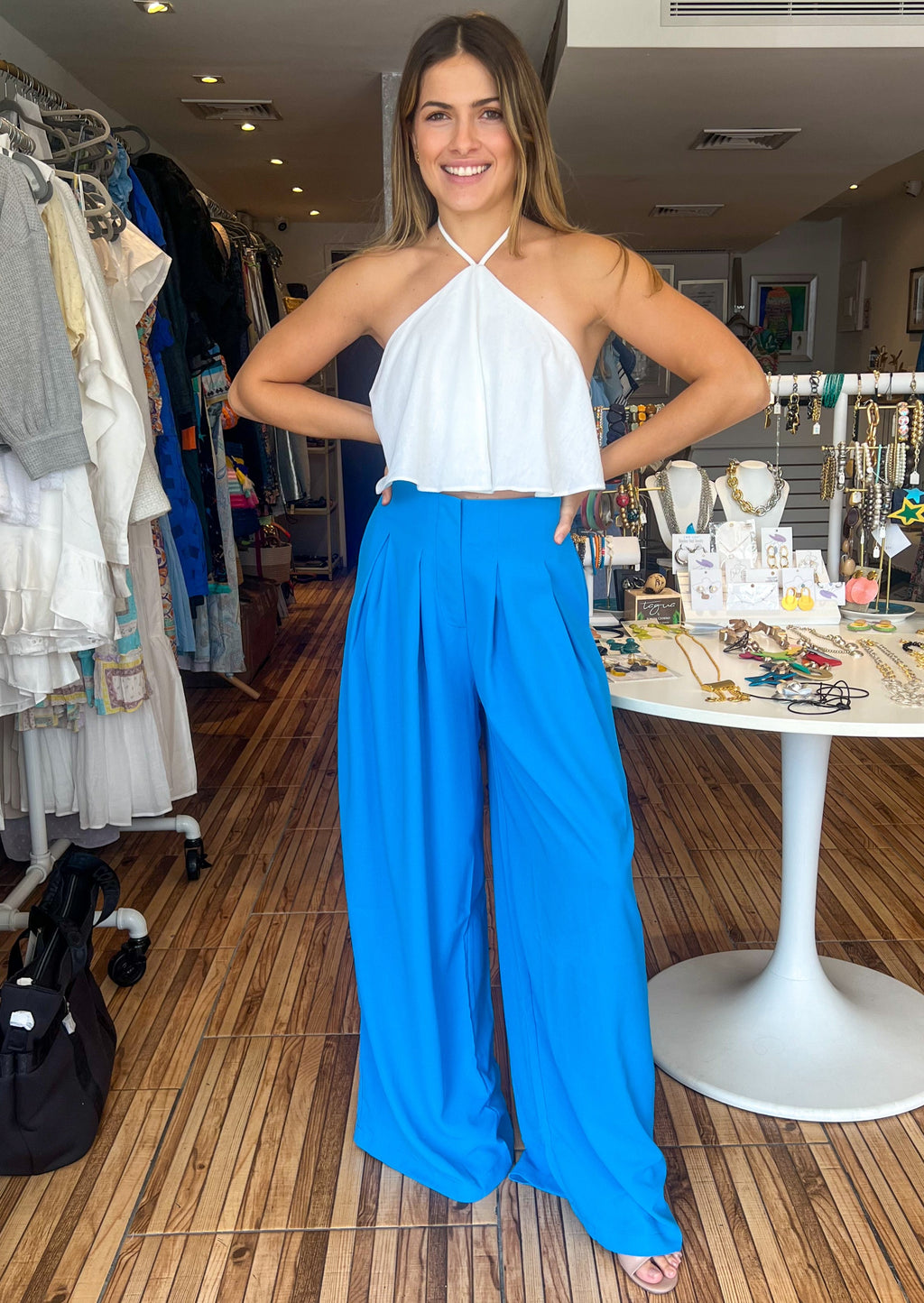 Ocean blue pleated wide leg trousers.