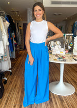 Load image into Gallery viewer, Ocean blue pleated wide leg trousers.
