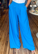 Load image into Gallery viewer, Ocean blue pleated wide leg trousers.
