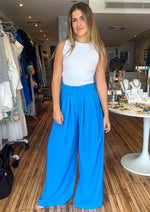 Load image into Gallery viewer, Ocean blue pleated wide leg trousers.
